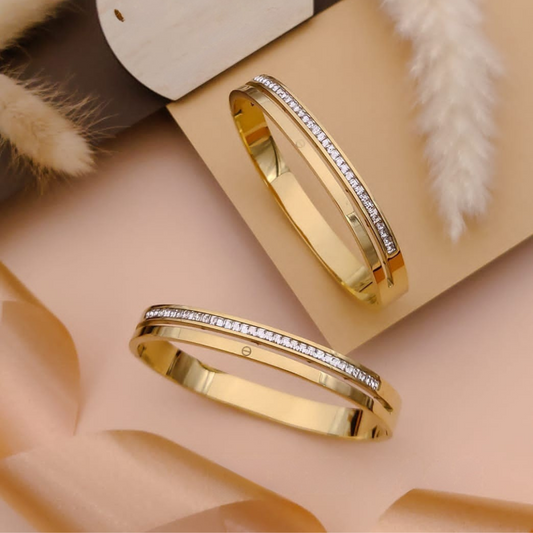 Single slim line of diamonds across the band Bangle